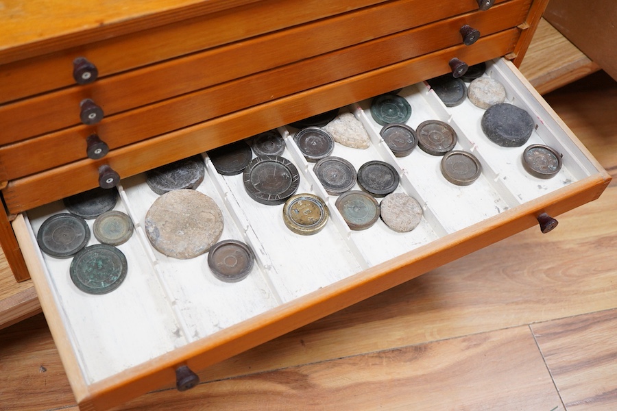 A collection of mainly Medieval to 19th century bronze and lead imperial circular trade weights, with a few Roman and later examples, stamped with Royal Cyphers, weights, the dagger assay mark for London, other proof mar